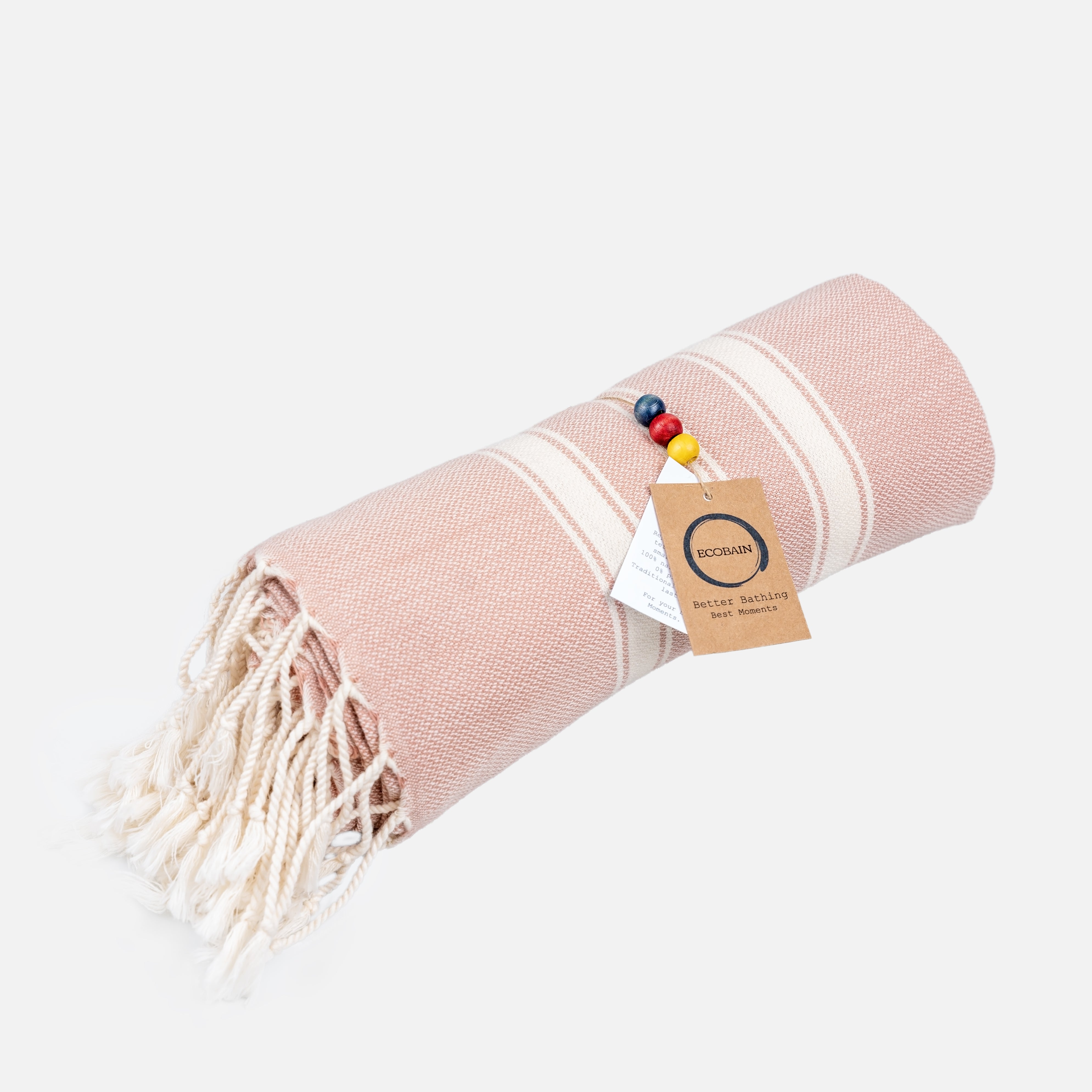 Nahaufnahme der traditionellen Webstruktur des Ecobain Hamamtuchs 'New Classic' in zartem Rosé. Das Bild verdeutlicht die meisterhafte Verarbeitung der weichen, gekämmten und langstapeligen Baumwolle. Ein plastikfreies Design Statement, das durch pestizidfreien Anbau, extreme Saugkraft und eine besonders edle Haptik überzeugt – ein hochwertiges Geschenk für alle, die bewusste Entschleunigung suchen.